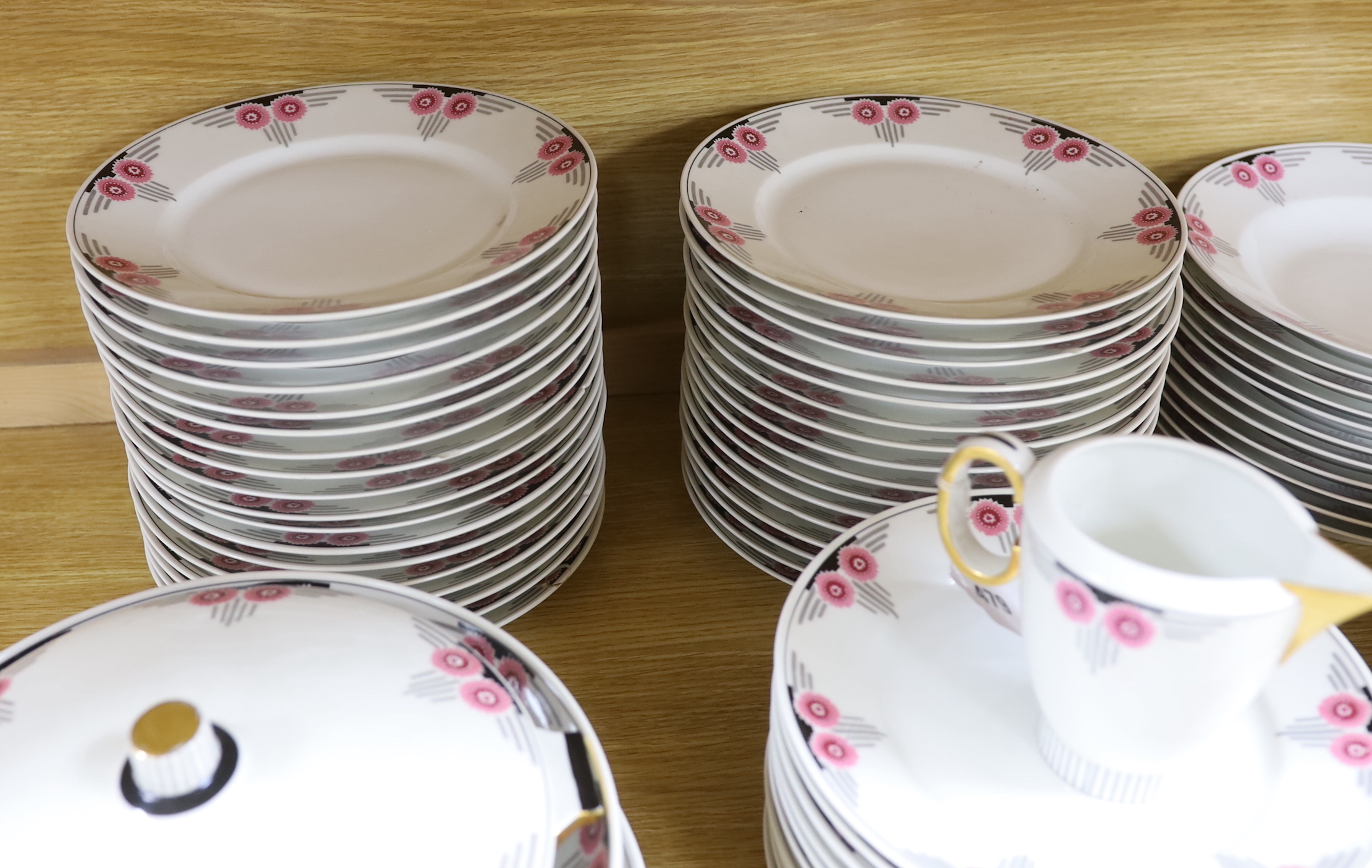 A comprehensive Art Deco Limoges, porcelain part dinner service